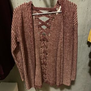 Long sleeved sweater - open in back but not fully!